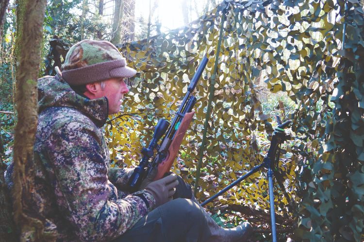 Mat Manning waiting for squirrels with his air rifle